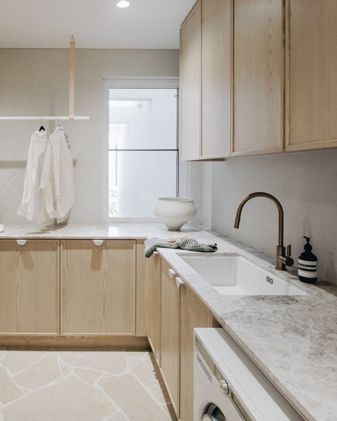 Effortless elegance meets everyday functionality // Turko Argento The refined limestone adds a sleek touch to this modern laundry, bringing style to even the most practical spaces. #NaturalStone #UniqStone Build I @roussos_build Architecture | @proskearchitects Interior design |@tessia_id Photography | @_christopher_morrison Stone |@signorinotilegallery #naturalstone #silverstone #limestone #kitchenbenchtops #benchtopsadelaide #adelaidebenchtops #stonebenchtops #marble #adelaidemarble #mar... Plaster Range Hood, Kitchen Benchtops, Modern Laundry, Stone Bench, Venetian Plaster, Effortless Elegance, Range Hood, Joinery, Natural Stones