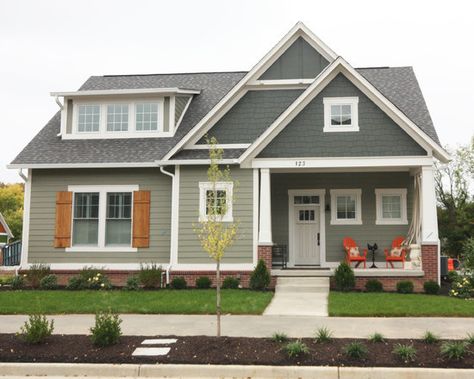 love this house color with the wood shutters! Connected Gray Sherwin Williams Exterior, Sw Connected Gray Exterior, Connected Gray Sherwin Williams, Two Tone Exterior, Green Siding House, Exterior Cottage, Victorian Living Room Furniture, Green House Exterior, Gable Trim