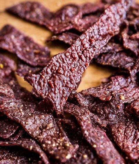 Traeger beef jerky Trager Grill Beef Jerky, Traeger Beef Jerky, Traeger Jerky Recipe, Traeger Jerky, Smoker Beef Jerky, Peppered Beef Jerky, Jerky Marinade Recipes, Beef Jerky Marinade, Smoked Jerky