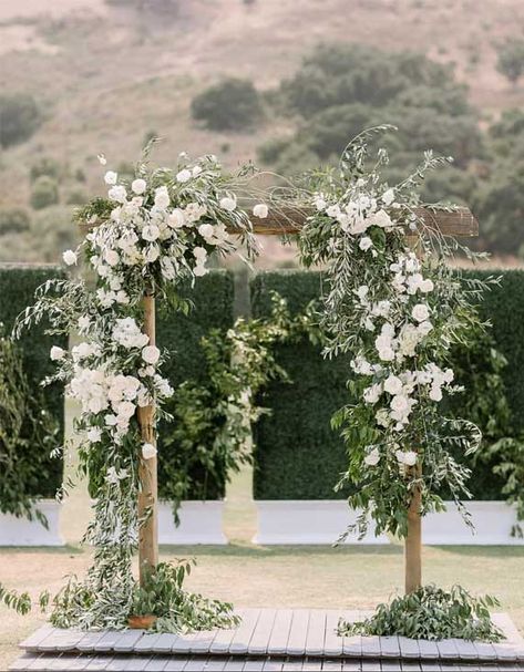 8 Stunning greenery wedding arches and Wedding Altar decorations | wedding arches, wedding ceremony decors, wedding arch decors, greenery wedding arches #weddingarches #weddingceremonydecor #weddingaltar Pergola Wedding, Wedding Arch Greenery, Wedding Altar Decorations, Rustic Spring Wedding, Wedding Arches Outdoors, Wedding Ceremony Ideas, Wedding Ceremony Arch, Wedding Arch Flowers, Wedding Arbour