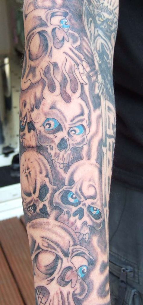 Blue eyed skulls Shoulder Sleeve Tattoos, Skull Hand Tattoo, Skull Hand, Skull Tattoo Design, Skull Tattoos, Skull Tattoo, Hand Tattoos, Sleeve Tattoos, Art Tattoo