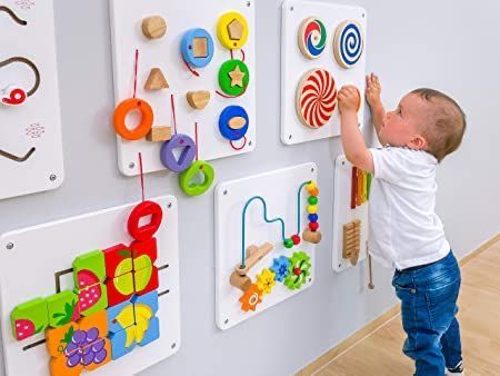 Pediatric Office Decor, Daycare Room Design, Game Motor, Wall Elements, Preschool Designs, Daycare Decor, Sensory Wall, Daycare Design, Wall Game