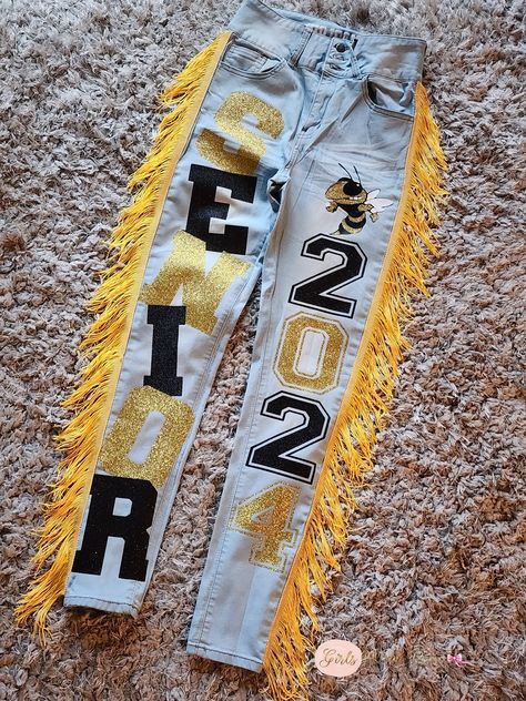 Senior Jeans Black And Gold, Senior Class Pants, Junior Homecoming Pants, Homecoming Diy Pants, Black And Gold Senior Jeans, Senior Hoco Jeans Ideas, Mathletes Vs Athletes Outfits, Homecoming Pants Ideas Junior, Senior Overalls Ideas High Schools 2025