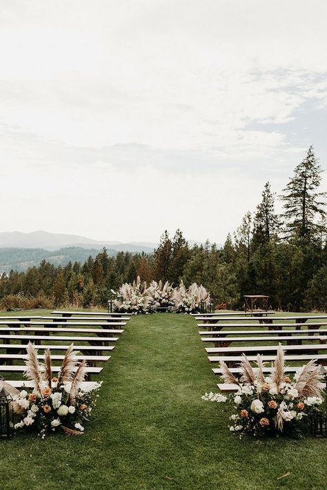 outdoor wedding ceremony with white benches overlooking beautiful mountain landscape, minimal yet dramatic wedding floral arrangement, modern wedding flowers, decor inspiration for wedding Aisle Decorations, Wedding Motifs, Deco Champetre, Wedding Ceremony Ideas, Modern Wedding Flowers, Extravagant Wedding, Wedding Ceremony Flowers, Grace Loves Lace, Floral Arrangements Wedding