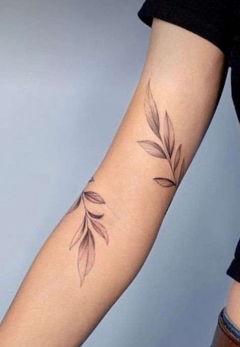 Vine Tattoos that you will Love Forever Foliage Tattoo, Blatt Tattoos, Arm Wrap Tattoo, Olive Tattoo, Wrap Around Wrist Tattoos, Around Arm Tattoo, Wrap Around Tattoo, Wrap Tattoo, Upper Arm Tattoos