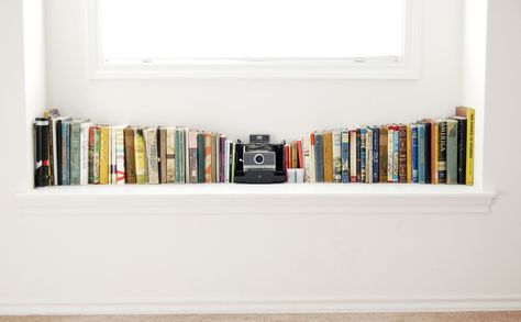 Idea for our old Polaroid camera and books. @jonathan budisantoso Windowsill Ideas, Baby Shelves, Window Sill Decor, Brighter Bedroom, Window Ledge, White Books, Display Storage, Book Display, Shelf Styling