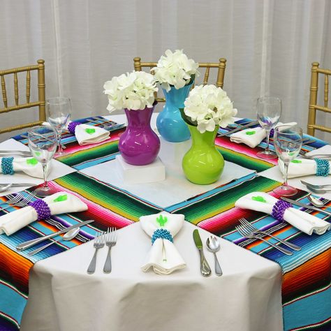 Behold the quiet power of negative space, where the absence of color is the loudest guest.  For this Mexican fiesta tablecape, we use whitespace to isolate and highlight the vibrant colors of a serape table runner. Coastal Birthday, Coral Party, Turquoise Party, Christmas Candle Centerpiece, Cocktail Mixology, Birthday Cocktails, Party Layout, Party Checklist, Christmas World