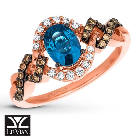 The luscious Blueberry Sapphire center of this Le Vian® ring for her is framed by shimmering curls of Vanilla Diamonds®. Rich Chocolate Diamonds® wind along each side of the 14K Strawberry Gold® band, bringing the total diamond weight of the ring to 1/4 carat. Le Vian®. Discover the Legend. Diamond Total Carat Weight may range from .23 - .28 carats.  Sapphire is commonly subjected to enhancement processes or treatments such as ... Levian Jewelry, Sapphire Engagement Ring Set, Vintage Engagement Rings Sapphire, Vintage Wedding Jewelry, Kay Jewelry, 0 Interest, Jewelry Advice, Chocolate Diamonds, Le Vian