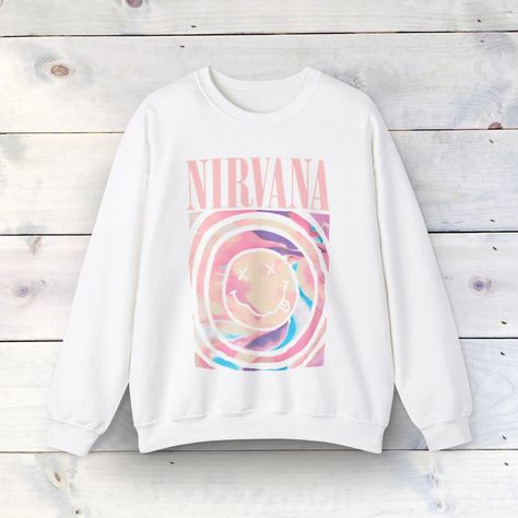 Introducing our Nirvana-Inspired Unisex Heavy Blend Crewneck Sweatshirt – your go-to choice for ultimate comfort and timeless style. Whether you're a die-hard fan or just seeking comfort in fashion, this sweatshirt is designed to elevate your wardrobe in any situation. 🌈 Fresh Designs, Lasting Comfort: Crafted from a premium blend of 50% cotton and 50% polyester (8.0 oz/yd²), our sweatshirt ensures a cozy feel, making it an ideal companion for the colder months. The polyester-cotton combination White Nirvana Sweatshirt, Nirvana Sweatshirt, Preppy Sweatshirts, Cute Preppy Outfits, Work Outs, New York Jets, Die Hard, Fresh Design, Comfort Style