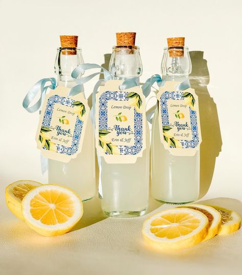 She Found Her Main Squeeze 🍋 Party Favours 🍋 Lemon Drop 2 Ounces Vanilla- Infused vodka 1 Ounce freshly squeezed lemon juice 🍋 1/2 ounce simple syrup Shake over ice 🧊 Bottles and corks from the dollar store Edit and download tags for free from my site #lemonparty #lemonparty🍋 #shefoundhermainsqueeze #lemonpartydecor #lemonpartyfavors #bridalshower #bridalshowerideas Lemon Drop Theme Party, She Found Her Main Squeeze Bachelorette Party, She Found Her Main Squeeze Bridal Party Favors, Bridal Shower She Found Her Main Squeeze, Lemon Bachelorette, Engagement Party Favours, Main Squeeze Bachelorette Party, Found Her Main Squeeze, She Found Her Main Squeeze