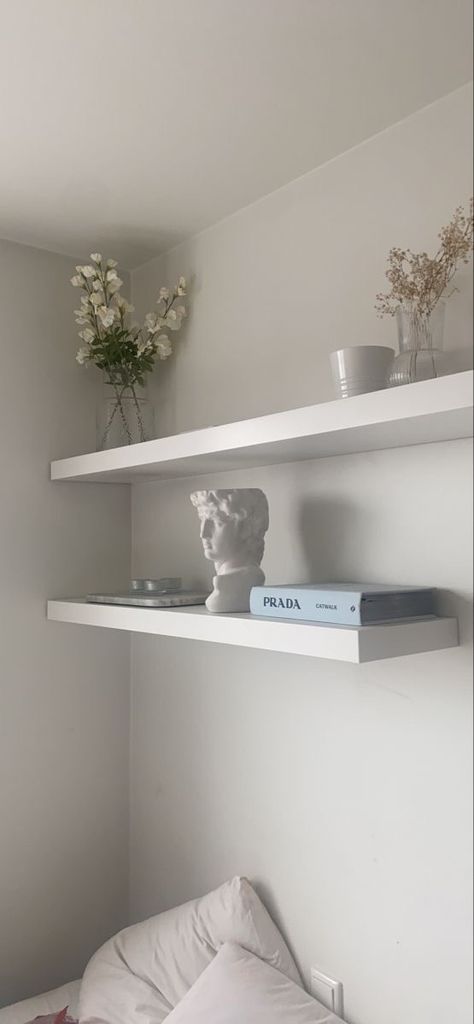 White Shelfs On Wall Bedroom, Shelf Decor Bedroom Aesthetic Wall Shelves, Floating Shelves Inspo Bedroom, Bedroom Floating Shelf Decor, Floating Shelves Aesthetic Bedroom, White Bedroom Shelves, Decor For Shelves In Bedroom, Over Bed Shelf Decor, Decorate Shelves In Bedroom