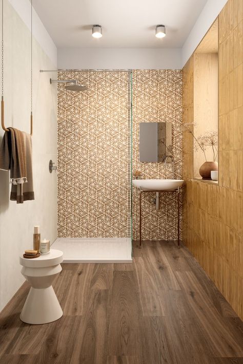 Terracreta Cesello Chamotte by Marca Corona dominates the shower wall of a warm-toned bathroom with its maiolica-inspired two-tone pattern. The hand-crafted feel of the hexagonal glazed porcelain stoneware is paired with Multiforme Opale bricks - a more polished style resembling coloured glass. A natural element is added by the wood effect knots and veinings of Elisir Royal Castano lining the floor. Brick Texture Wall, Patterned Tile, Yellow Bathroom, Bathroom Tile Ideas, Yellow Tile, Floor Edging, Brick Texture, Texture Wall, Contemporary Floor