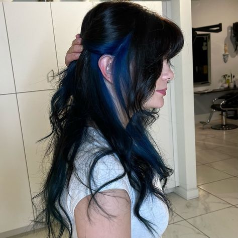 ⊹₊⟡⋆💙⊹₊⟡⋆ the prettiest deep blue & black makeover from yesterday 🖤💙 i always love a secret halo color, it’s the perfect subtle kiss of vibrant expression under an inky black veil <3 the before was a mix of virgin hair, faded black, & purple. i picked away at each individual strand and brought them all up to the desired level for this gorgeous blue ✨ we completed this look with a layered, long and shaggy cut that will give her lots of volume despite having very thick hair! i’d love to do m... Deep Blue Hair, Black Hair With Blue Highlights, Very Thick Hair, Shaggy Cut, Royal Blue Hair, Blue Hair Highlights, Blue Black Hair, Purple I, Blue Streaks