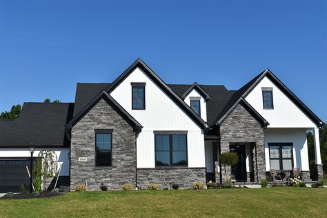 Gallery – Prestige Stone White House Black Trim With Stone, Modern House With Stone Accent Exterior, Black Stone On House Exterior, Ironstone Siding Exterior, White House Black Trim Stone Accent, Black Stone Exterior House, Black Stone House Exterior, House With Stone Accent Exterior, Brick And Siding Exterior