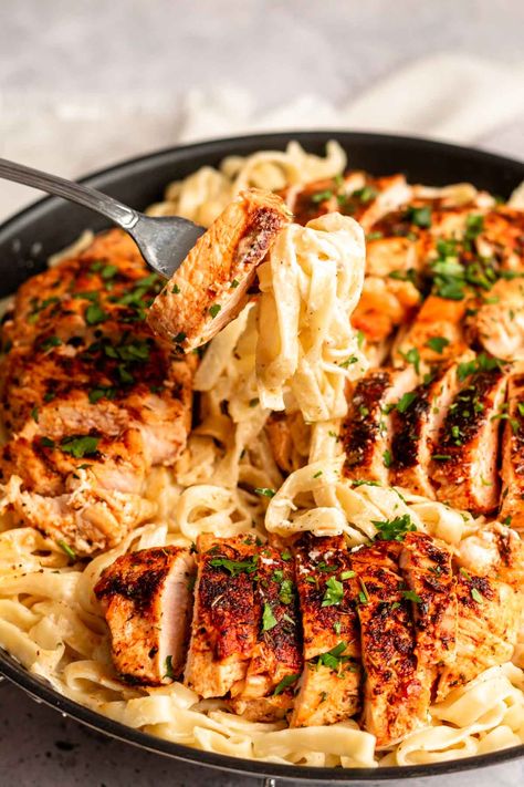 Fork with blackened chicken and fettuccine alfredo. Cajun Chicken Alfredo Pasta, Blackened Chicken Alfredo, Cajun Seasoning Mix, Cajun Chicken Pasta Recipes, Cajun Chicken Alfredo, Chicken Fettuccine Alfredo, Cajun Shrimp Pasta, Homemade Cajun Seasoning, Chicken Fettuccine