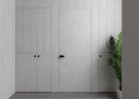 MWAI uses pale grey tones in west London flat renovation for two design enthusiasts Piano Area, Minimal Door, Fun Architecture, Hidden Doors, Polished Plaster, Interior Minimalista, Minimalist Apartment, Geometric Tiles, 아파트 인테리어