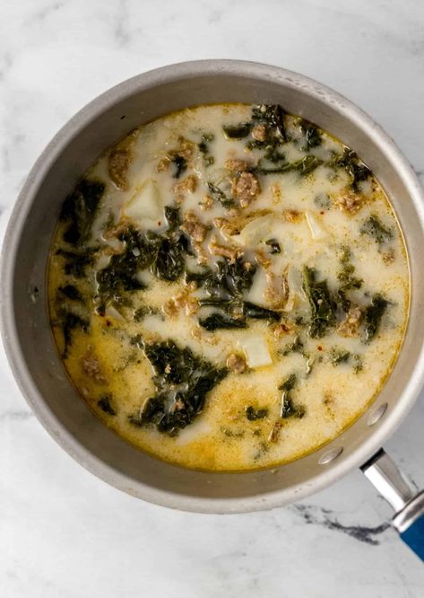 Try making a cozy bowl or two of this Potato, Kale, and Sausage Soup that is similar to Zuppa Toscana Soup which is rich in flavor with a creamy broth and super delicious! simplylakita.com #zuppatoscanasoup #zuppasoup Potato Soup With Kale, Kale And Sausage Soup, Kale Potato Soup, Sausage And Potato Soup, Kale And Sausage, Zuppa Soup, Olive Garden Soups, Soup With Kale, Kale Soup Recipes