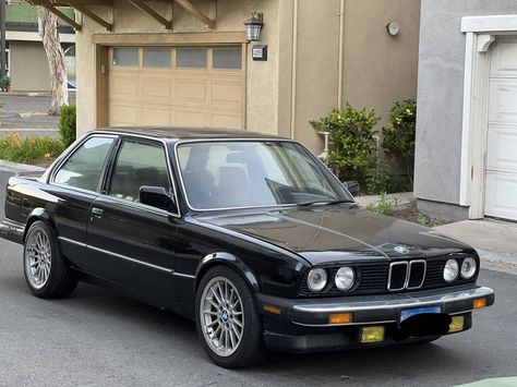 The E30 generation BMW 3-series was produced from 1983 through 1994 in various shapes, sizes, and configurations. The slow 318i was a fuel saver, the inline-6 powered 325i was a mixture of quick and smooth, and the 4-cylinder powered M3 was a riot. Today's E30 started as a basic 325i, but has been given the engine from an E36 BMW M3 and has the CA smog certificate and BAR sticker to prove it. #325i #BMW #E30 #E36 #German #M3 Bmw 318, Bmw 325i, E36 Bmw, Bmw E30, Red Interiors, Bmw 3 Series, Bmw M3, Fuel, Bmw Car