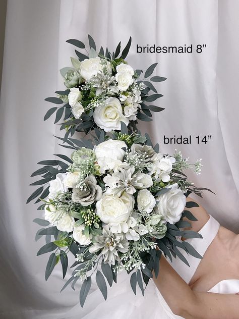 White Flowers And Greenery Bridesmaid Bouquet, Bride And Bridesmaid Flowers, Farmhouse Wedding Bouquet, White And Silver Wedding Bouquets, Bride Vs Bridesmaid Bouquet, Faux Flower Bridal Bouquet, White And Green Wedding Flowers Bridesmaid Bouquets, Maid Of Honor Flower Bouquets, Wedding Bouquet Sizes