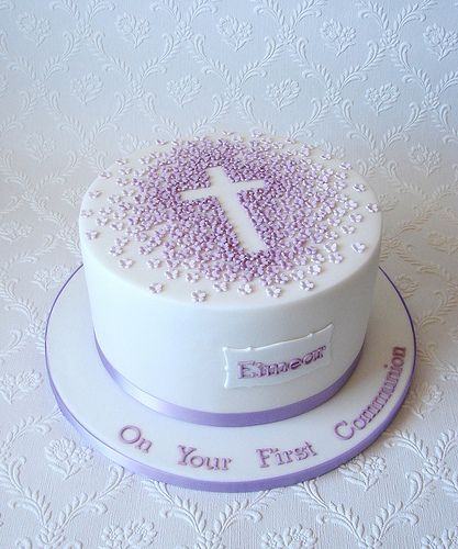 Repeat design of a First Communion I did a little while ago but with this one I did it in shades of lilac.  Used my plaque cutter for the first time so delighted with how the plaque looks.  I really like the simplicity of this cake design :-) Baby Boy Christening Cake, Open Book Cakes, Comunion Cake, Tårta Design, Christening Cake Boy, First Holy Communion Cake, Holy Communion Cakes, Cross Cakes, Religious Cakes