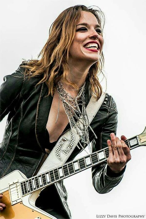 Lzzy Hale: Front Lady for the band Halestorm. Izzy Hale, Lizzy Hale, Holding A Guitar, Female Rock Stars, Josh Smith, Rock And Roll Girl, Lzzy Hale, Sales Strategies, Heavy Metal Girl