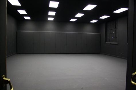 Black Box Aesthetic, Black Warehouse Exterior, Dark Dance Studio, Black Garage Interior, Black Dance Studio, Industrial Dance, Concrete Room, Dance Studio Design, Photography Studio Spaces