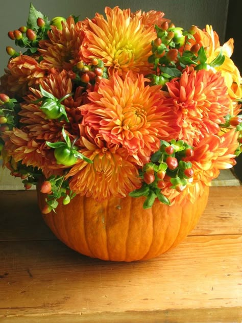 Pumpkin centerpieces Halloween Wedding Centerpieces, Fall Container Gardens, Pumpkin Vase, Pumpkin Arrangements, Fall Containers, Fall Flower Arrangements, Pumpkin Flower, Fall Arrangements, Pumpkin Centerpieces