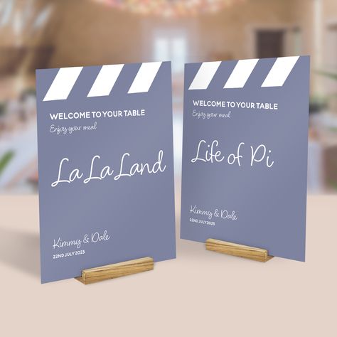 Movie Themed Table Numbers, Movie Wedding Seating Chart, Movie Wedding Centerpieces, Movie Themed Seating Chart, Movie Table Numbers, Film Themed Wedding, Wedding Table Themes Ideas, Wedding Movie Theme, Movie Wedding Ideas