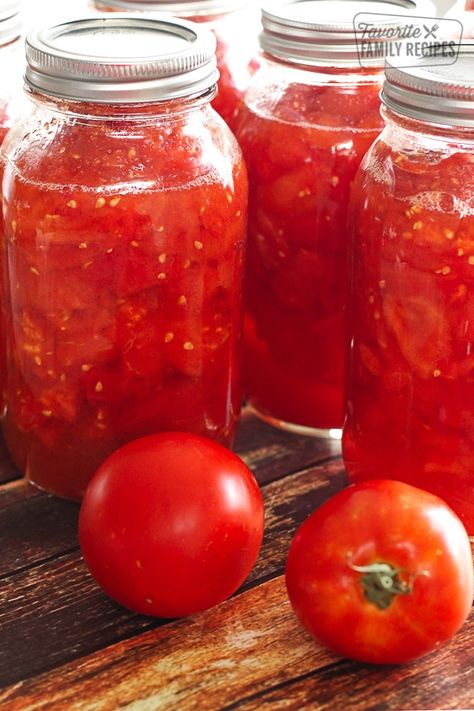 Learn How to Can Diced Tomatoes with this easy recipe and tutorial. It's easier than you think to eat garden tomatoes all year long! Homemade Tomato Juice, Recipes With Diced Tomatoes, Easy Canning, Can Diced Tomatoes, Garden Tomatoes, Tomatoes Recipe, Canning Diced Tomatoes, Spiced Pear, Alfredo Sauce Recipe