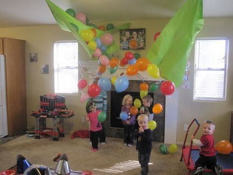 New Year’s Eve with the Kids: Fun Activities to Ring in the New Year! | Saving by Design Diy Balloon Drop, New Years Eve Traditions, Kids New Years Eve, New Years Eve Day, Balloon Games, Balloon Drop, Skirt Diy, Diy Balloon, New Year's Crafts