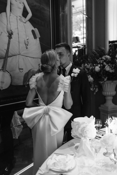 Leanne Hainsby wore a fit and flare Halfpenny London wedding dress with frilled sleeves, an oversized bow belt and a long veil London Wedding Dress, Halfpenny London, Chignon Bun, Bow Wedding Dress, Long Veil, Bridal Separates, Love Challenge, Gorgeous Couple, Wedding Bows