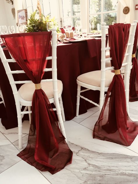 Burgundy chiffon vertical chair decor Burgundy Reception Decor, Burgundy Table Cloth Wedding Reception, Chivari Chairs Wedding, Red Chair Covers Wedding, Burgundy Chiffon Chair Sash, Mahogany Chiavari Chairs Wedding, Chivari Chairs, New Year Table, Chair Bows