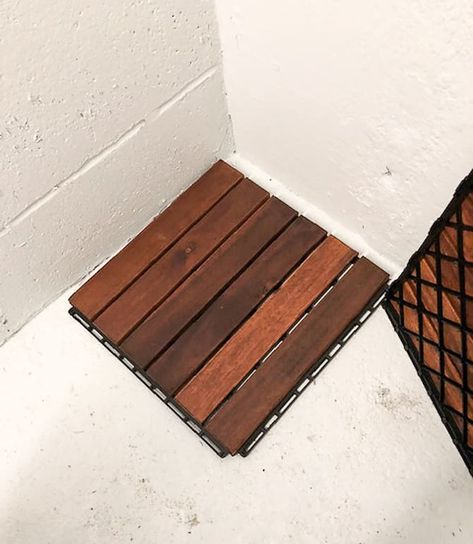 If you are looking for an inexpensive option for waterproof flooring, this post will show you how we laid a wood, waterproof flooring for the flip house shower for under $40. Teak Shower Floor, Cottage Showers, House On A Budget, Flip House, Upcycled Home, Pretty Bathrooms, Shower Floor Tile, Waterproofing Basement, Deck Tile