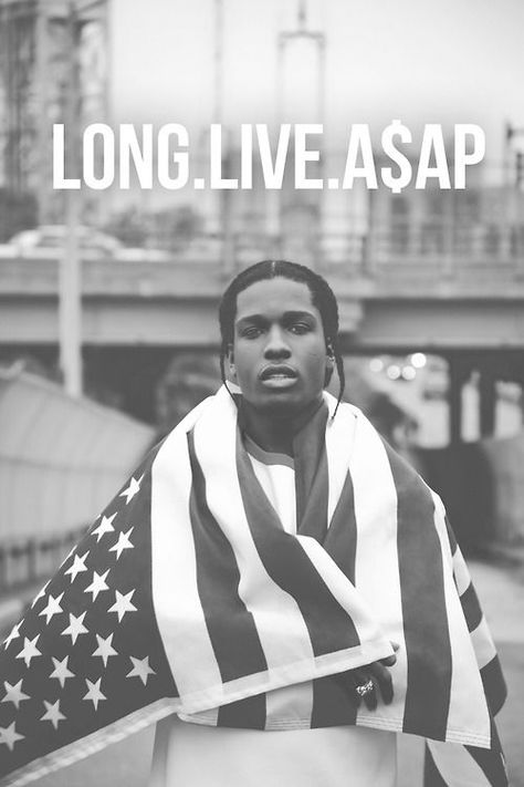 This photo uses a few elements of design that I notice. The use of black and white not only gives it a certain feel of age, but contrast is also very evident in black and white photos. There's also use of symmetry since A$AP Rocky is placed directly in the middle with American flag swung over his shoulders in even fashion. Long Live Asap, Asap Rock, Asap Rocky Poster, Rocky Poster, Taylor Gang, Lord Pretty Flacko, Pretty Flacko, Cool Pops, A$ap Rocky