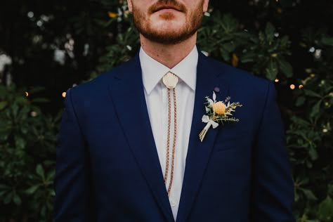 Texas in downtown austin. Allan house. Wedding inspiration. Bolo tie vibes Navy Suit Bolo Tie, Bolo Tie Groomsmen, Wedding Bolo Tie, Bolo Tie Wedding, Schoolhouse Wedding, Blue Tuxedo Wedding, Groom Blue Suit, Bolo Tie Men, Green Wedding Suit