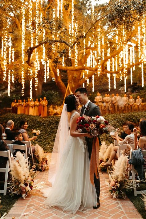 romantic and magical forest wedding ceremony lit up with string fairy lights in the trees #ceremonylights #firstkiss #hanginglights Twilight Wedding, Fairy Lights Wedding, Forest Theme Wedding, Calamigos Ranch, Enchanted Forest Wedding, Future Wedding Plans, Outdoor Wedding Decorations, Whimsical Wedding, Wedding Mood