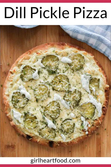 Super simple but so delicious, this dill pickle pizza is made for dill pickle lovers! It has a deliciously garlicky and creamy base that's topped with plenty of melty mozzarella cheese and thinly sliced pickle. This easy pizza recipe is perfect for your next pizza night at home! Pickle Pizza With Garlic Sauce, Pizza With Garlic Sauce, Garlic Dill Sauce, Dill Pickle Pizza, Quick Dough, Pickle Pizza Recipe, Pickle Pizza, Pickle Recipes Homemade, Crispy Pizza Crust