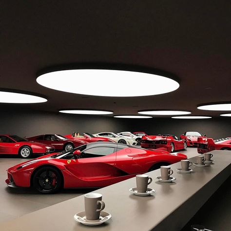 Ferrari collector @swizzcars's personal garage is that awesome he can hold his own Cars & Coffee event any day of the week. Not even joking! ☕️🏎 Photos are by the lucky photographers who got a peek into the Ferrari Headquarters of World Domination (disclaimer: NOT its name at all...but you could be forgiven for thinking so with these interstellar lights!?✨) 📸 Photos 2-4 by @zachbrehl & 📸 5-8 by @carswithluke ✨ #f12tdf #Enzo #f40 #f50 #madeinitaly #ferrari #ferrarif12 #ferrarif40 #ferrarif50 # Ferrari Garage Ideas, Ferrari Garage, Cars Garage, F12 Tdf, Garage Design Interior, Luxury Car Garage, Wallpaper Luxury, Luxury Garage, Luxurious Cars