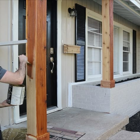 Cedar Wood Posts Front Porch, Wood Posts Front Porch Farmhouse, Wrapping Porch Posts, Stain For Cedar Beams, Wood Post Wrap Ideas, Front Entrance Post Ideas, Wrapped Patio Posts, Cedar Porch Posts Columns, Porch Beam Wrap