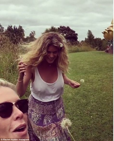 Bouncing around: Rachel's ample assets were unrestrained as she failed to contain a large ... Nikki Glaser, Rachel Hunter, British Women, Jennifer Love, Jumping For Joy, Grey Tank Top, New Video, Auckland, Her Hair