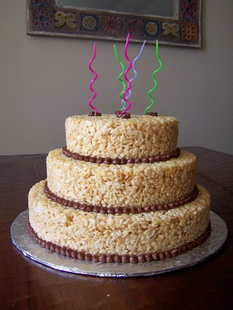 Rice Krispie Cake - great idea for adam's birthday!  different cereals for the different layers. Rice Krispie Cake Ideas, Rice Crispy Treat Cake, Making Rice Crispy Treats, Krispie Cakes, Rice Krispie Treats Cake, Rice Krispie Cake, Cereal Party, Rice Crispy Cake, Rice Crispies Recipe