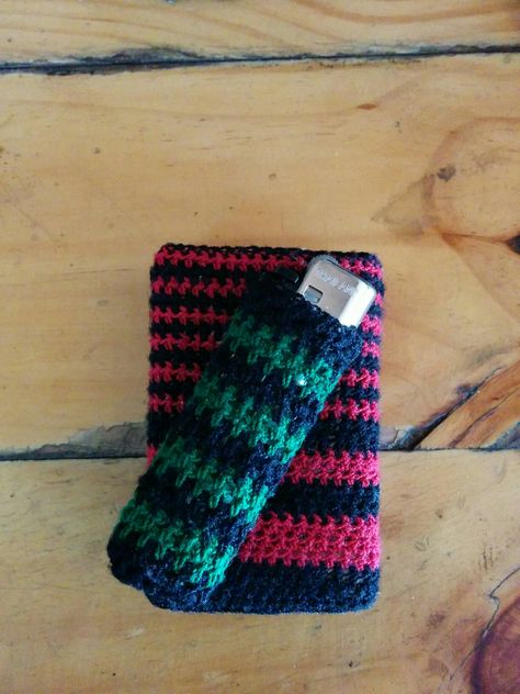 The levels of contrast - cigarette and lighter case..  #crochet #handmade #threadening #cigarette #lighter #case #stringless #red #green #black #color #itsthreadening Crochet Lighter Holder Pattern Free, Green Black Color, Diy Crochet Top, Hippie Crochet, Lighter Case, Cases Diy, Granny Square Crochet Pattern, Crochet Handmade, Crafty Diy