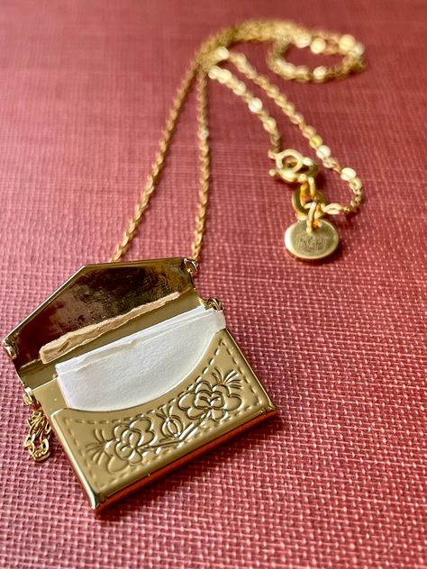 Micro affirmation necklace: tiny charm with a tiny message of hope. This locket is a gold envelope charm etched with a lovely flower pattern strung on 18in gold-plated chain. Envelope charm actually opens and is filled with a blank 2 by 1 inch slip of paper on which you can write the message of your choice! Customize the charm with an affirmation for a friend a verse to keep close a note of strength in hardship a promise to a loved one a mantra to ground you a treasured memory or date Perfect wa Affirmation Necklace, Gold Envelope, Gold Envelopes, Pretty Jewelry Necklaces, Tiny Charm, Charlottesville Va, Catholic Jewelry, Message Of Hope, Girly Jewelry