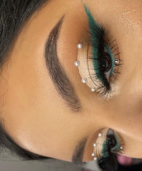 Makeup For Esmeralda Dress, Green Pearl Makeup, Teal Prom Makeup Looks, Green And Silver Makeup Looks, Dark Green Makeup Looks For Prom, Blue Pearl Makeup, Pearl Eyeshadow Look, Eyeshadow With Pearls, Prom Green Makeup