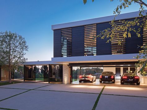 PART ONE: Modern Mansion With Wrap Around Pool and Glass-Walled Garage For $36 Million. (36 Pics) - if it's hip, it's here Small House Big Garage, Architecture Cool, Car Porch, Beverly Hills Mansion, A Modern House, Luxury Garage, Beverly Hills Houses, Modern Garage, Barns Sheds