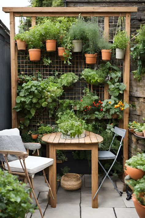 A patio garden can serve as an extension of your living space, offering a tranquil retreat for relaxation or entertaining. This post contains 21 ideas to help you create the perfect patio garden. Paved, small, cottage, back, apartment, a budget, layout, front, raise, UK, seating areas, flower pots, with steps, fire pit, bifold doors Apartment Patio Fire Pit Ideas, Small Garden In Apartment, Flowers On Terrace, Professional Garden Design, Small Shaded Garden Ideas, Garden Rental Ideas, Plants Outside Front Door Apartment, Small Potted Garden, Potting Area Ideas Spaces