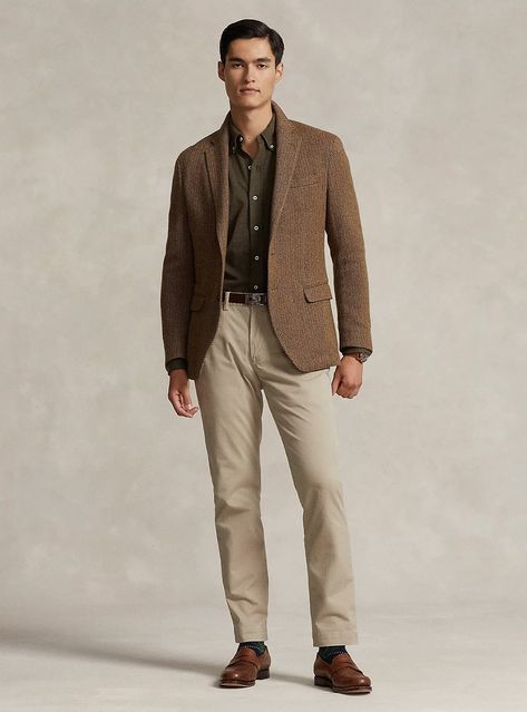 Experience timeless style with a textured brown herringbone blazer paired with an olive shirt and tan chinos, finished with elegant brown loafers. Perfect for those seeking a sophisticated yet approachable look. Olive Blazer Outfit, Tan Loafers Outfit, Brown Herringbone Blazer, Real Estate Outfits, Olive Blazer, Tan Chinos, Olive Shirt, Loafers Outfit, Herringbone Blazer