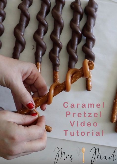 This quick video tutorial teaches you how to twist caramel onto a pretzel rod and dip it in chocolate. You will learn the trick to making beautiful caramel pretzels without big, flat 'feet'. #gift #caramelpretzel #tutorial Pretzel Sticks Recipe Dessert, Caramel Twist Pretzel Rods, Chocolate Covered Pretzels With Caramel, Choc Dipped Pretzel Rods, Caramel Dipped Pretzel Rods, Mini Chocolate Covered Pretzels, Easy Bake Sale Items That Sell, Candy Covered Pretzels, Caramel Chocolate Pretzel Rods