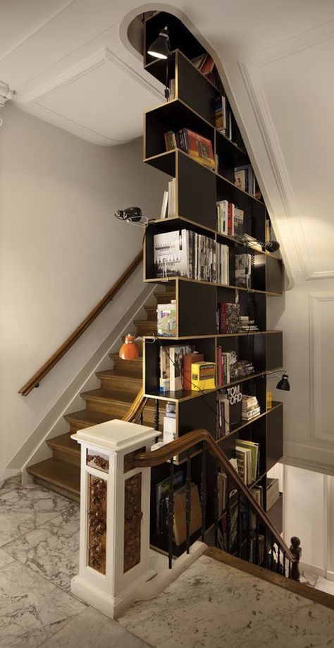 Fun bookcase in a stair well. Not a fan of the lights and overall it clashes with the rest of the finishes. Still very cool. Home Libraries, Design Del Prodotto, Home Library, Modern Office, Design Case, Home Fashion, 인테리어 디자인, My Dream Home, Design Interior