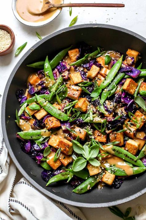 Easy tofu stir-fry with peanut satay sauce comes together in just 30 minutes and is perfect for a healthy, plant-based weeknight dinner. #tofurecipes #tofustirfry #veganrecipes #mealprepideas #stirfrysauce Is Tofu Healthy, Satay Tofu, Tofu Fried, Peanut Satay Sauce, Peanut Satay, Fried Recipes, Cooking Tofu, Satay Sauce, Tofu Stir Fry